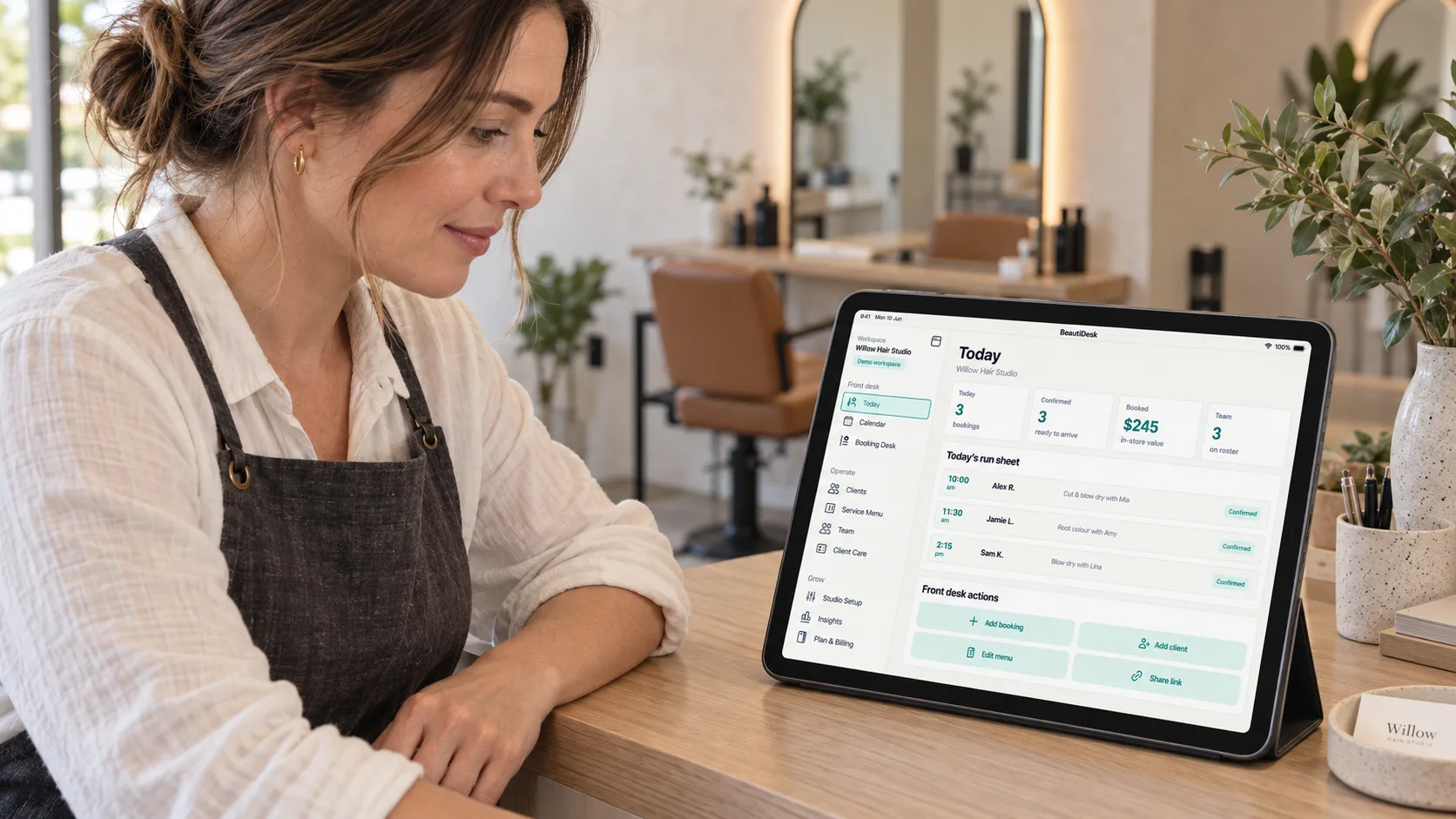 Illustrative hair salon front desk with BeautiDesk's daily appointment workspace on an iPad.